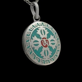 Türkises Amulett mit silbernem OM-Symbol und Doppeldorje