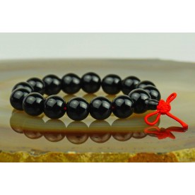 Onyx bracelet with a red ball coral